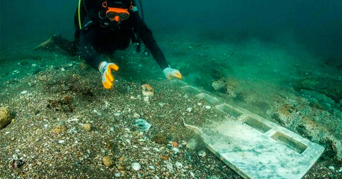 Diver in the Bay of Naples looking over a part of the Nabataean Temple to the god, Dushara;